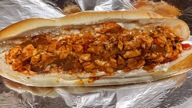 Buffalo Chicken Cheesesteak Sandwich.